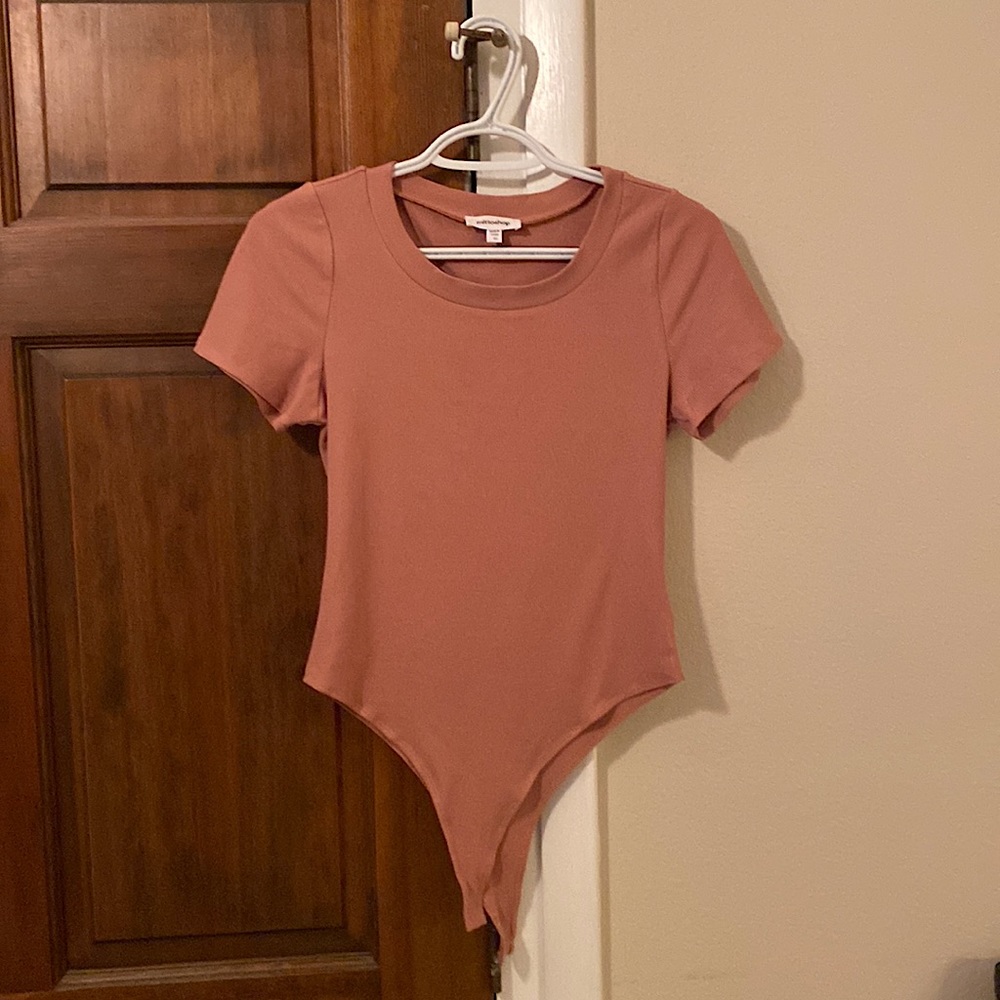 Salmon colored bodysuit